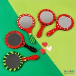 آینه دسته دار چوبی گرد یلدا طرح دختر گلنار